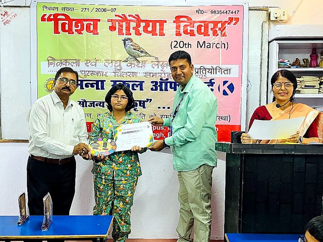 Guests handing over certificates to young participants